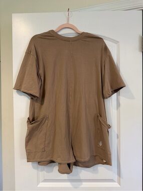 Free People Movement romper in taupe color
